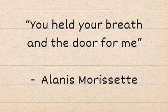 A piece of paper with the quote "You held your breath and the door for me” by Alanis Morissette